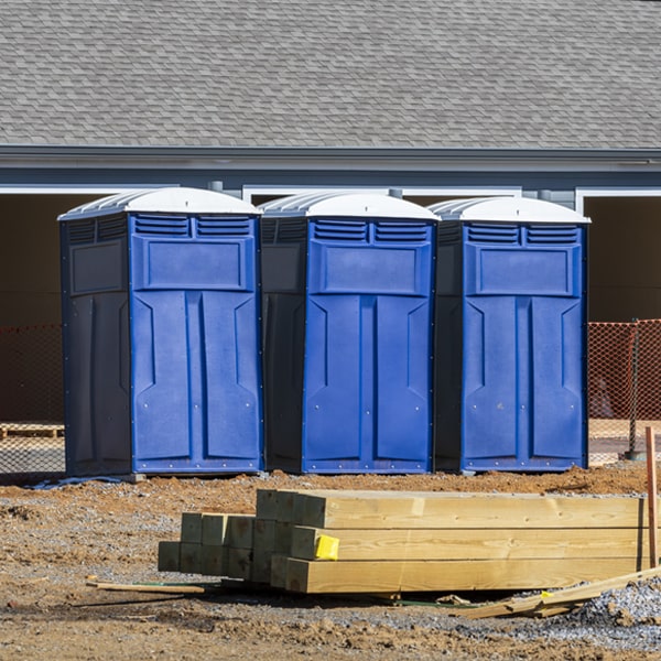 what is the cost difference between standard and deluxe portable toilet rentals in Vincent